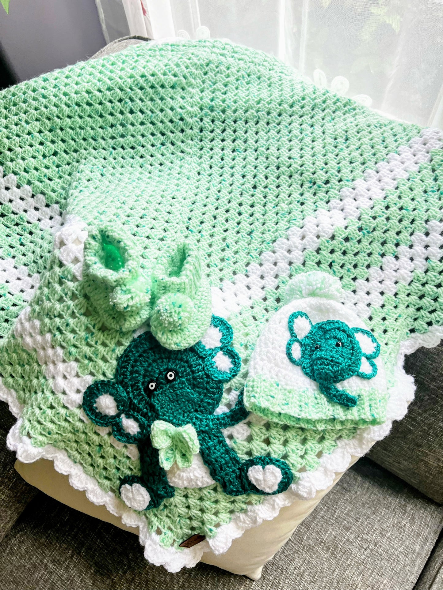 Soft Green Baby Blanket with Adorable Elephant Design
